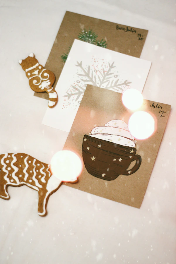 A cozy holiday card showcasing a hand-drawn winter scene with warm, inviting colors.