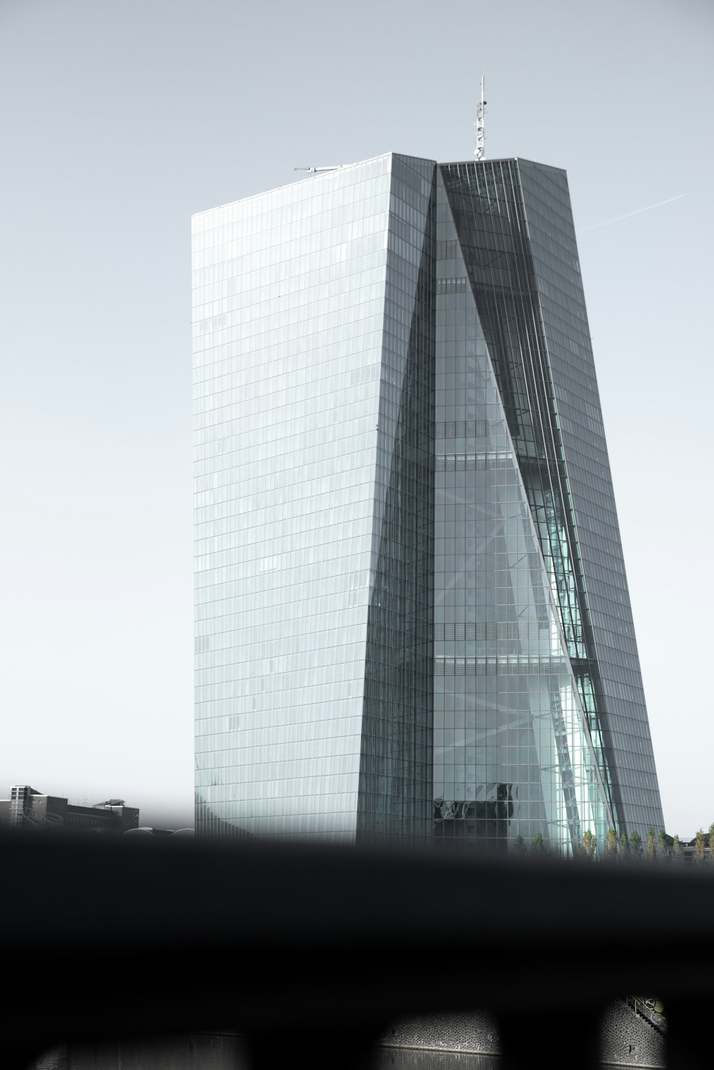 gray concrete building under white sky during daytime