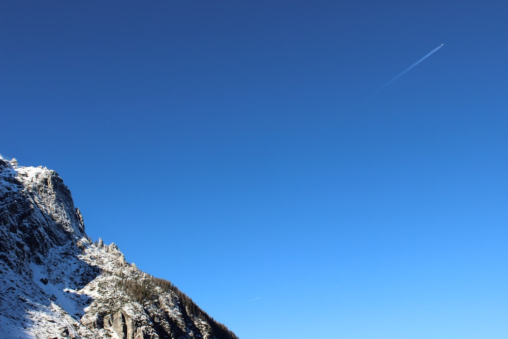 white and brown mountain under blue sky during daytime