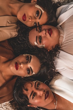woman in white shirt lying on bed