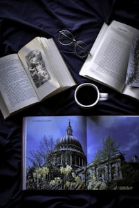 white ceramic mug on book page