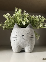 A small-batch ceramic planter with clean lines and a matte finish.