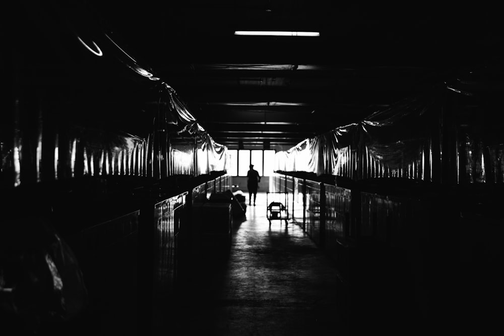 grayscale photo of a hallway
