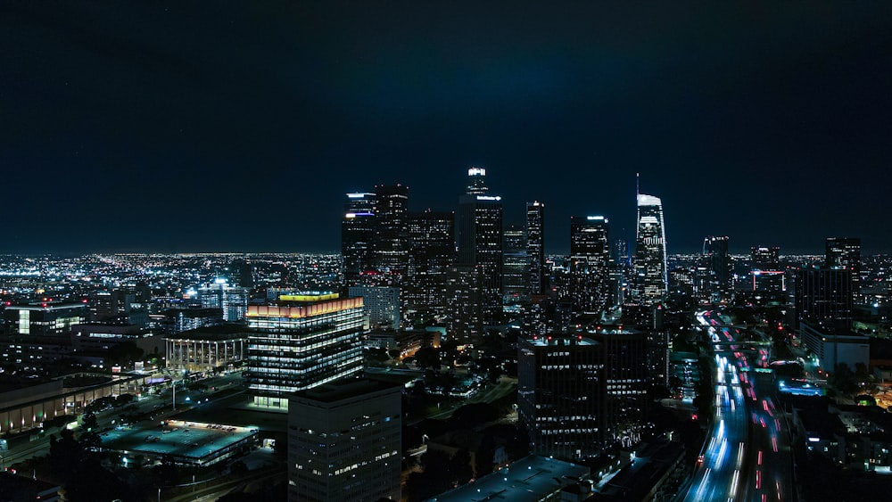 city skyline during night time