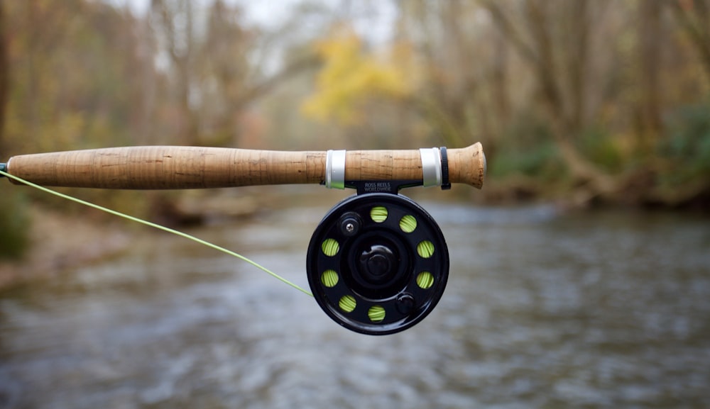 black and brown fishing rod