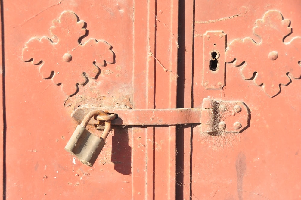 red steel door with padlock