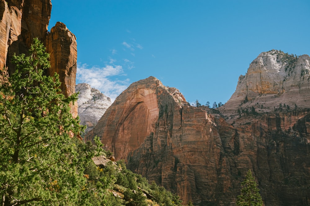 brown rocky mountain under blue sky during daytime