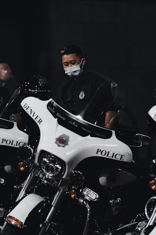 Close-up of modern police equipment funded by the Aurora Police Foundation displayed on a table.