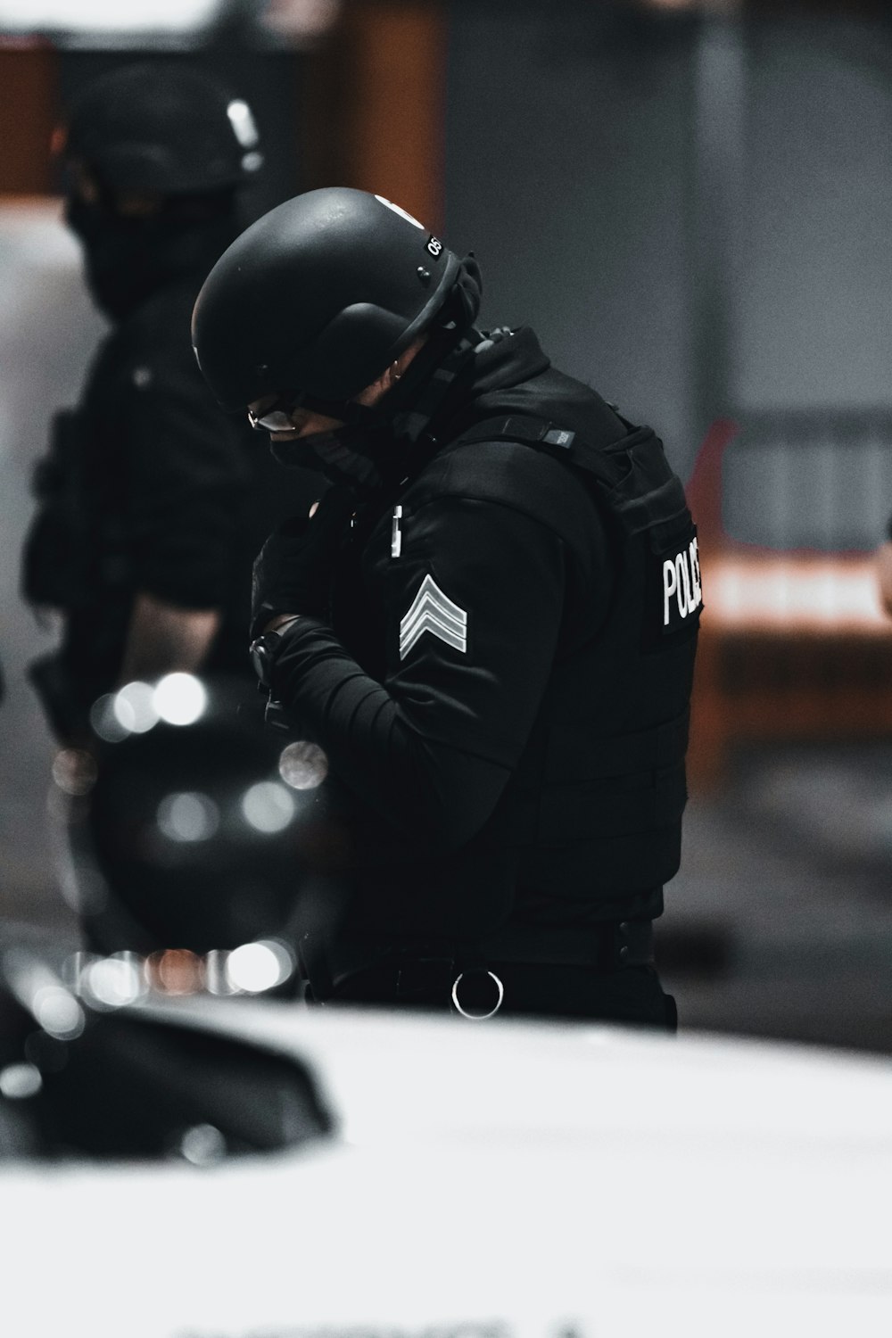 man in black jacket and helmet