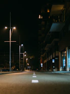 Bright LED streetlights illuminating a quiet neighborhood street