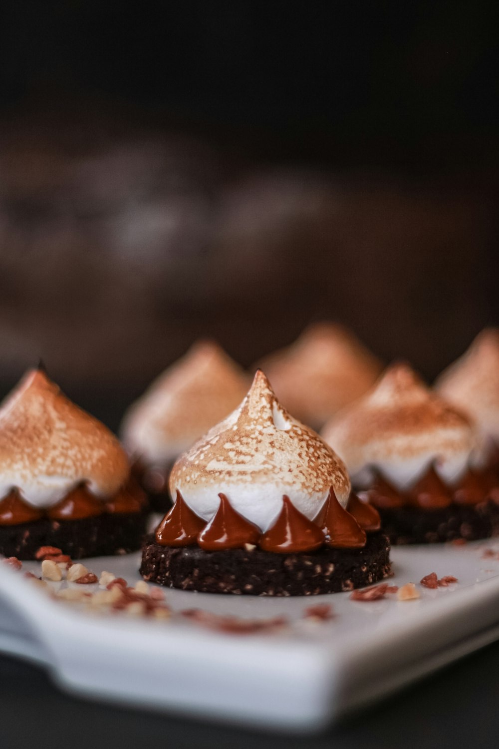 brown and white pastries on white ceramic plate