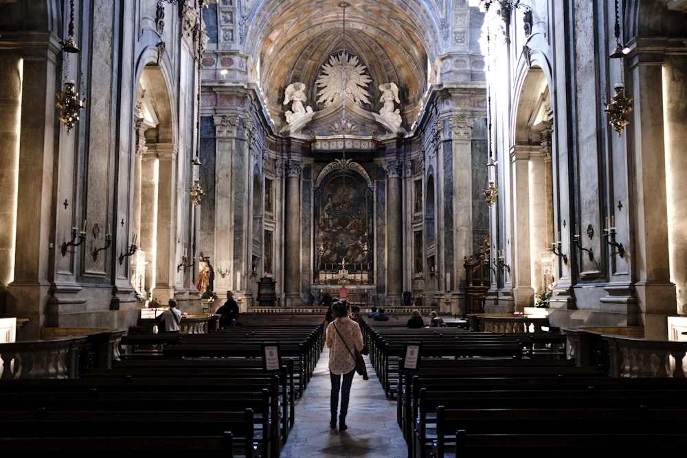 brown wooden chairs inside cathedral