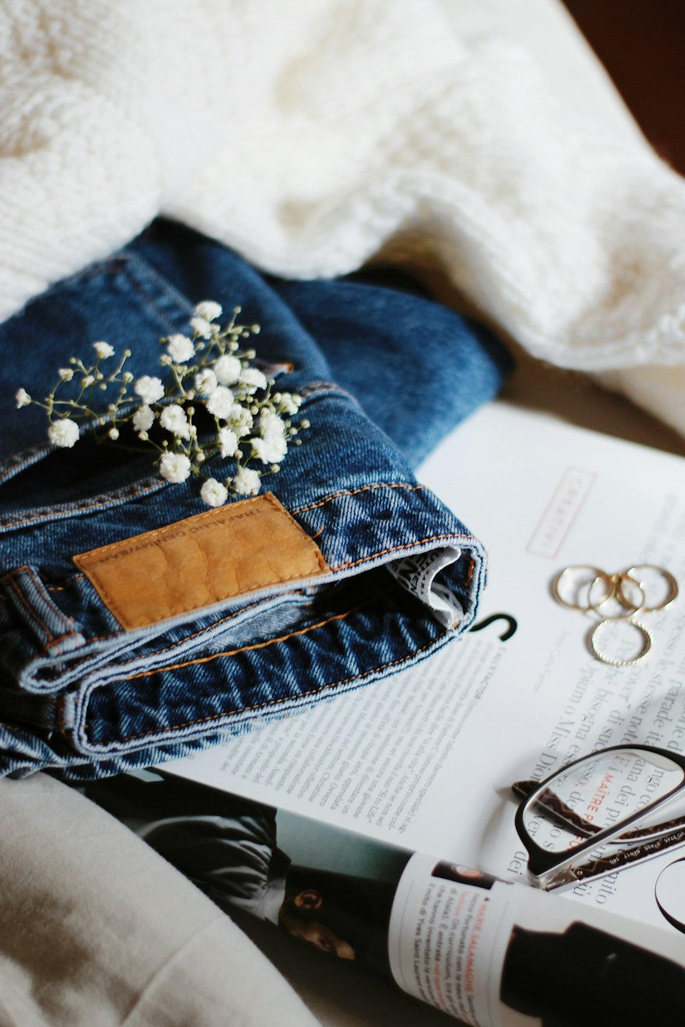 white flowers on blue denim textile