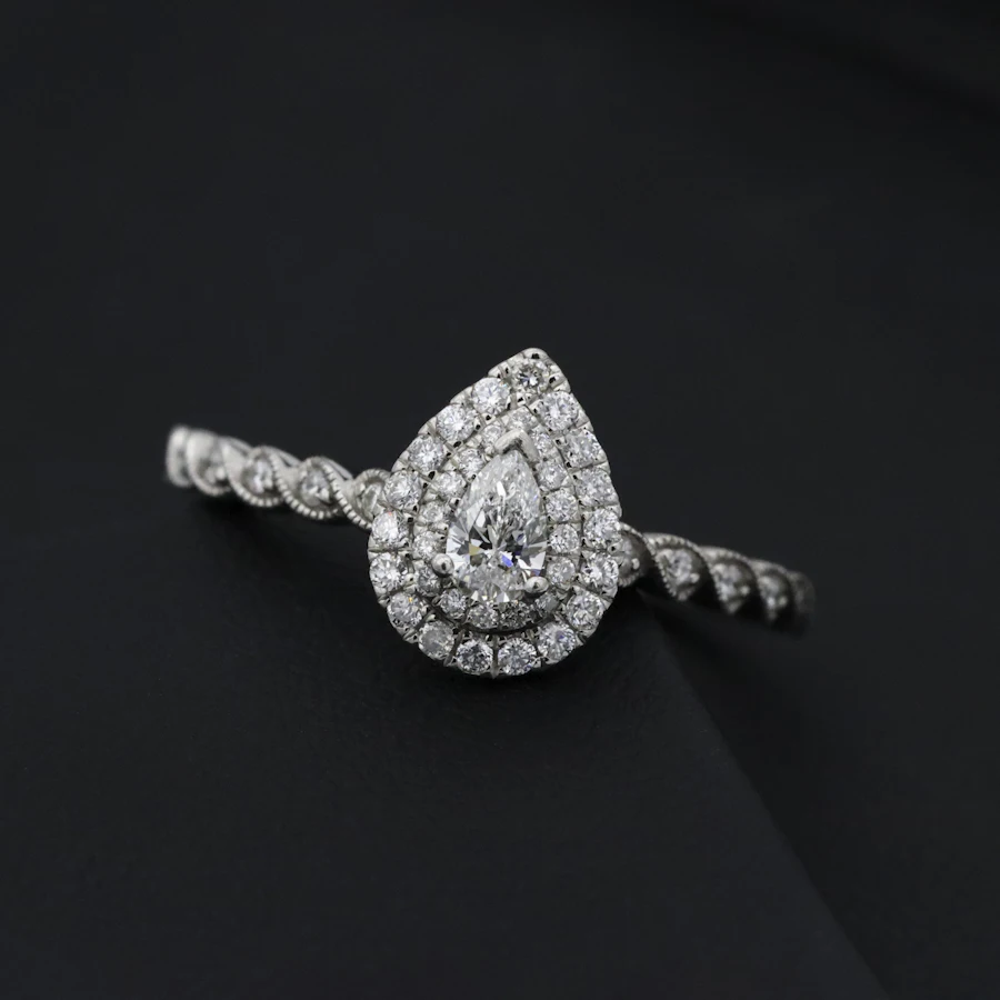 A diamond-set pendant on a fine chain