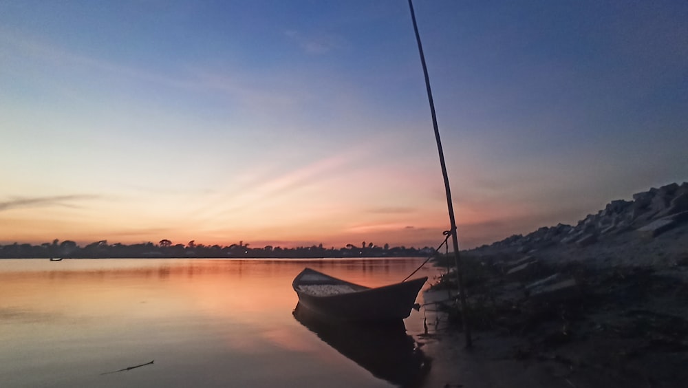 boat on water during sunset