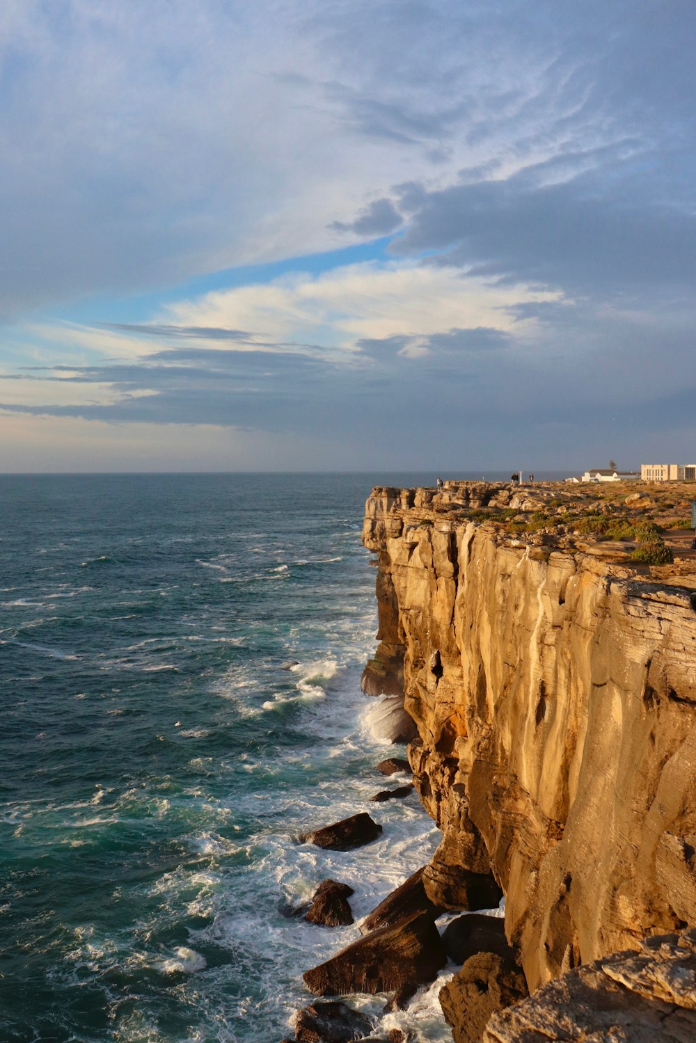 a view of the ocean from a cliff