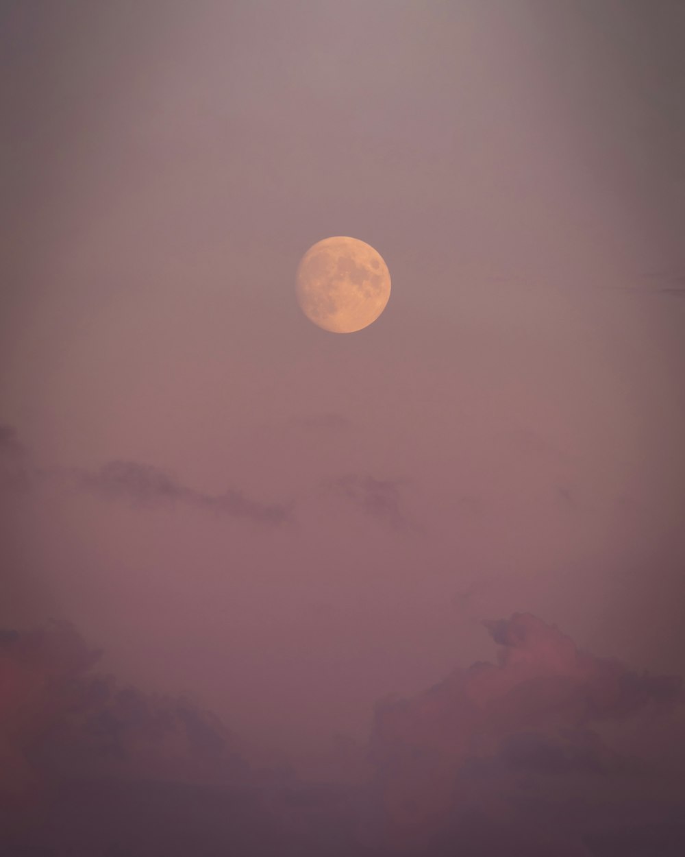 full moon over the clouds