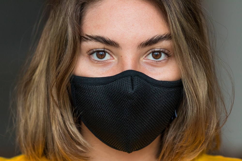 woman with black face mask