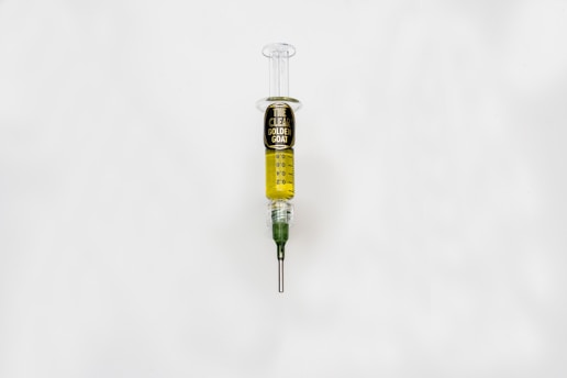 A syringe with a clear liquid representing zepbound injectable medication.