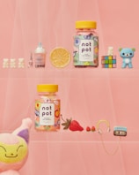 two yellow and white plastic bottles