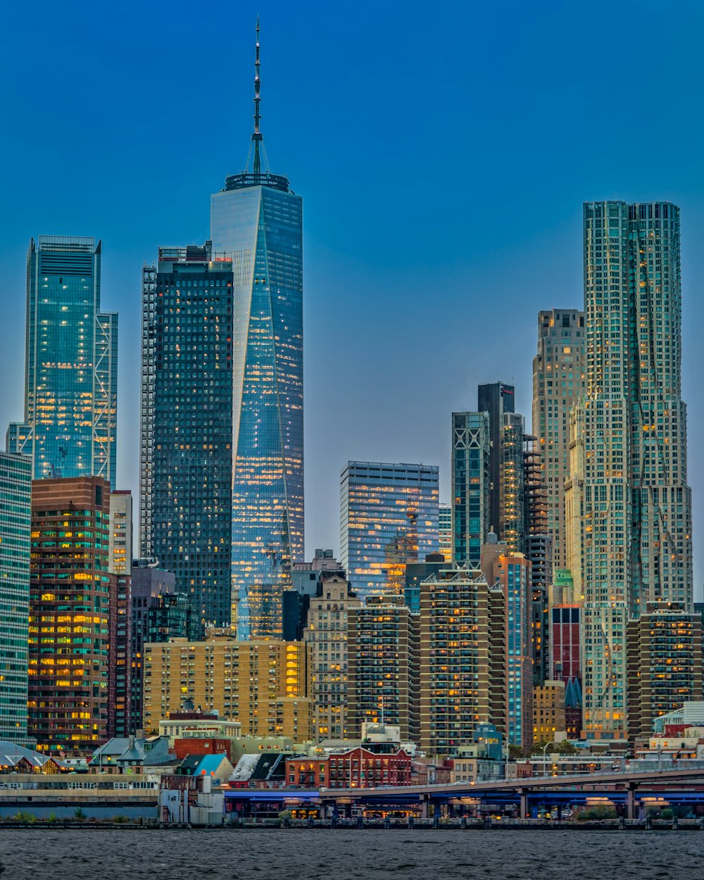 city skyline under blue sky during daytime