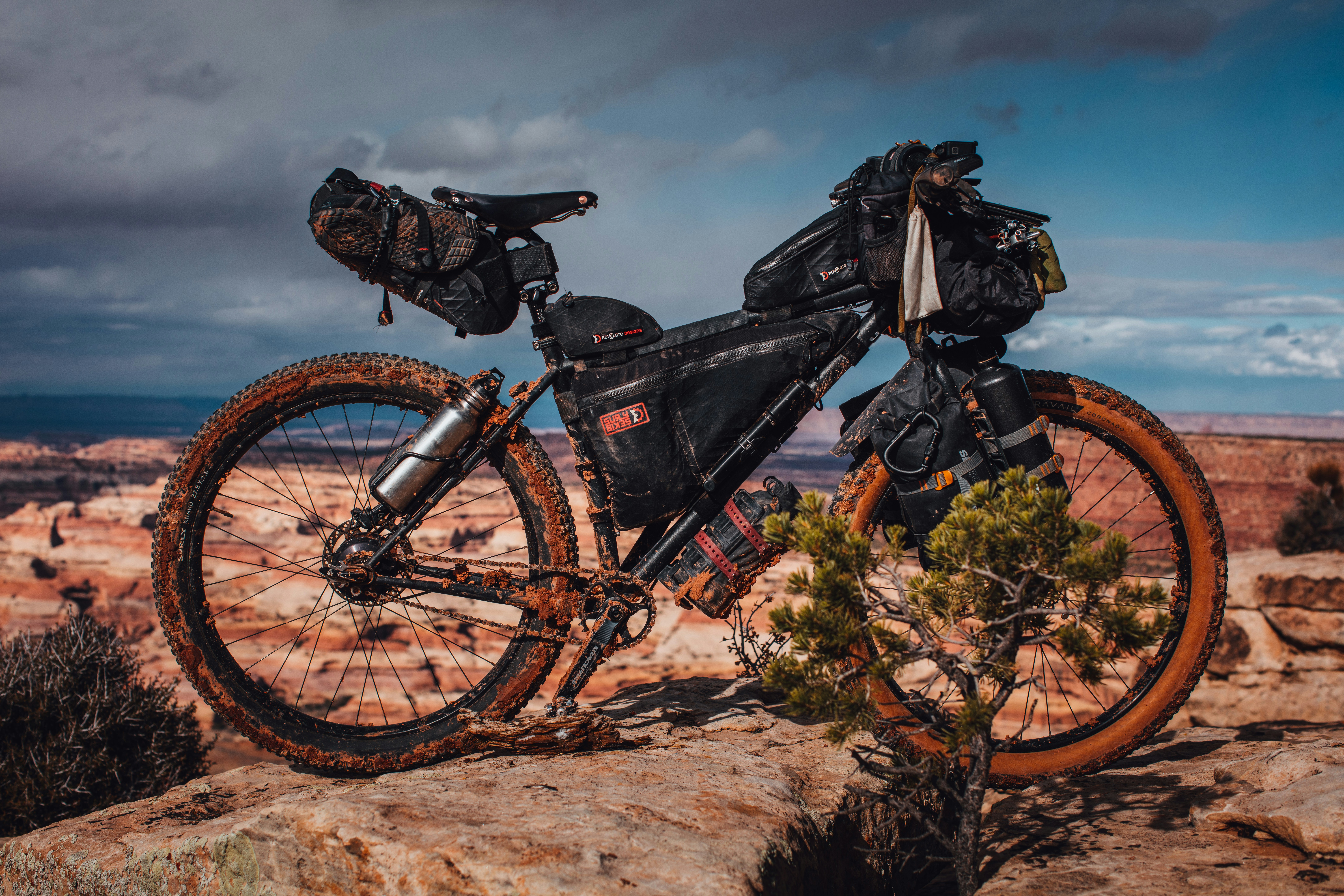 black mountain bike on brown grass field