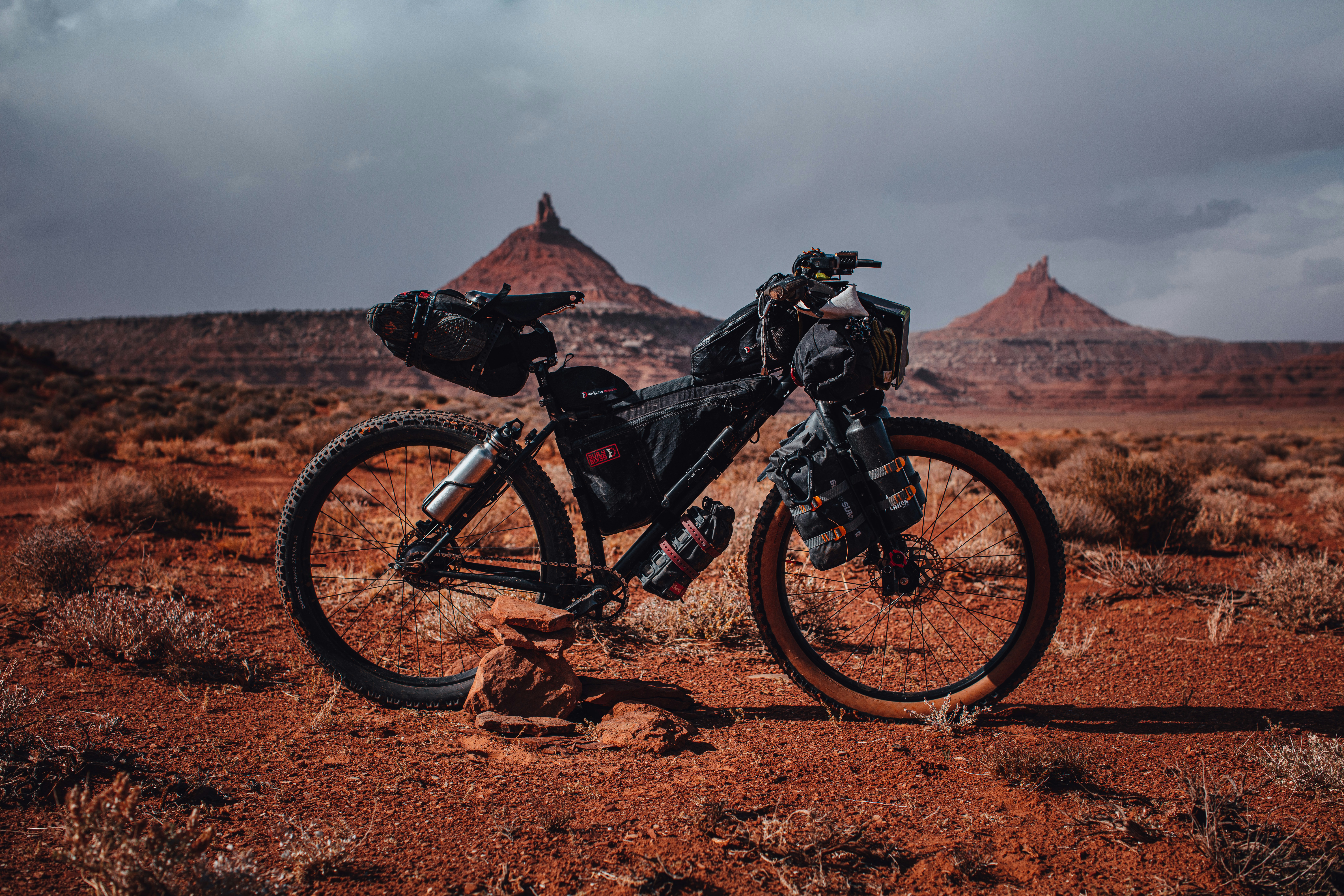 man in black and blue motocross helmet riding black motocross dirt bike