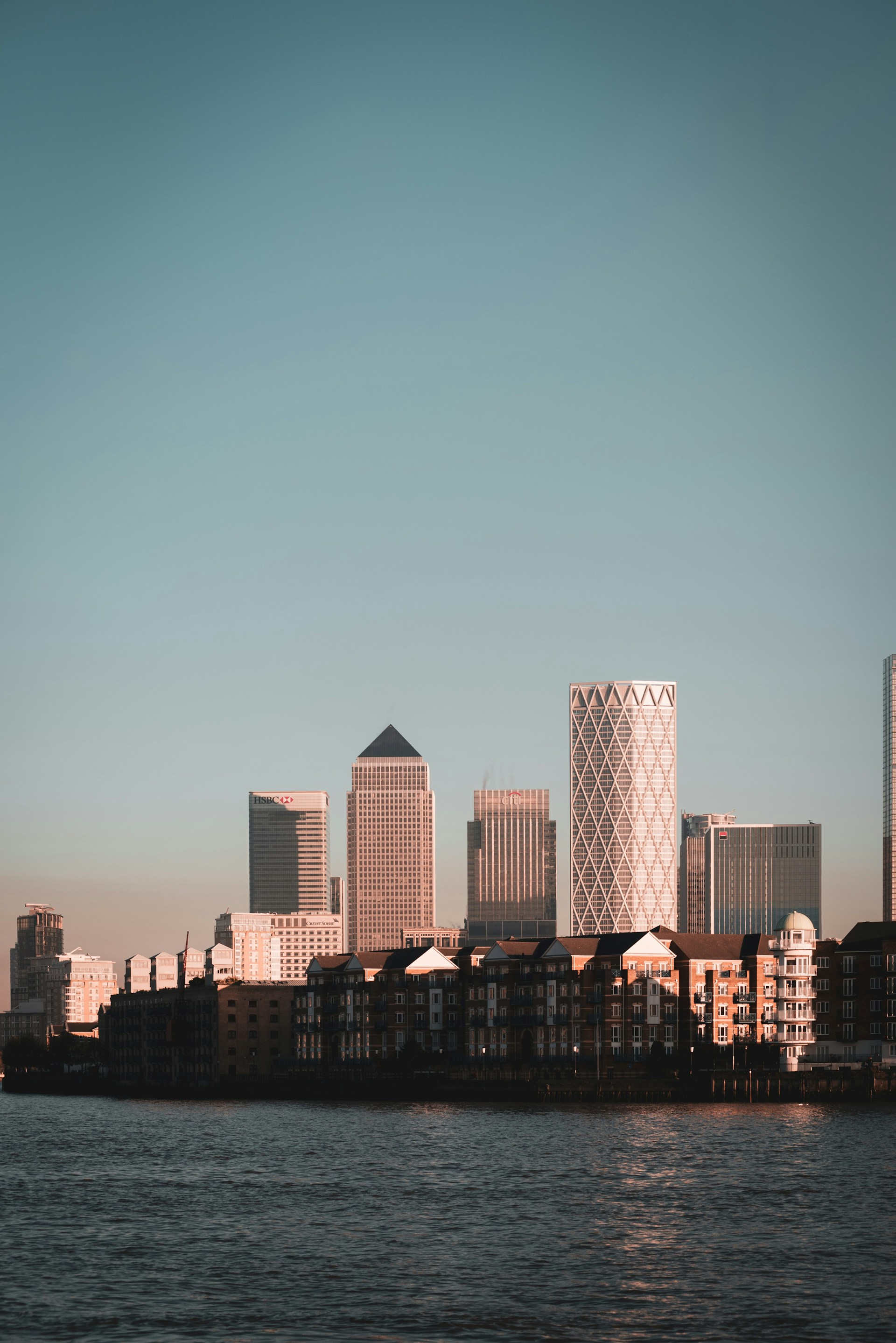 city skyline under blue sky during daytime