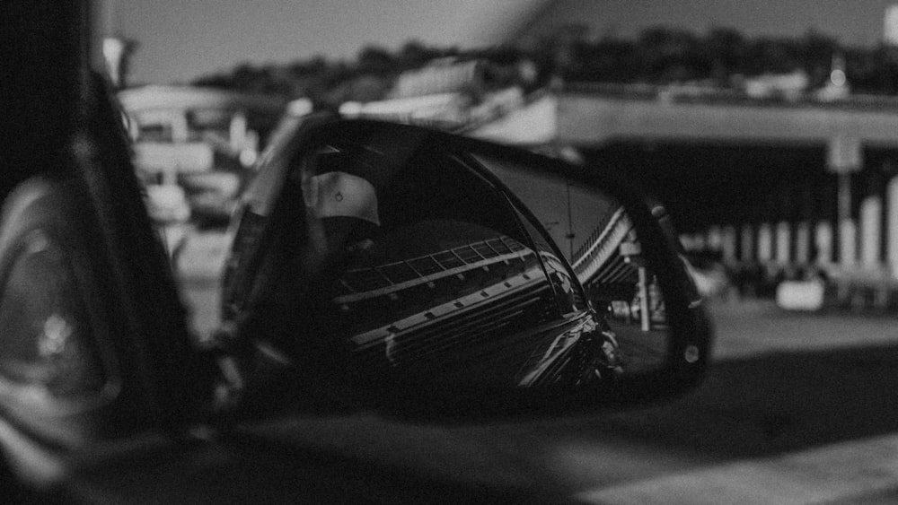 grayscale photo of car side mirror