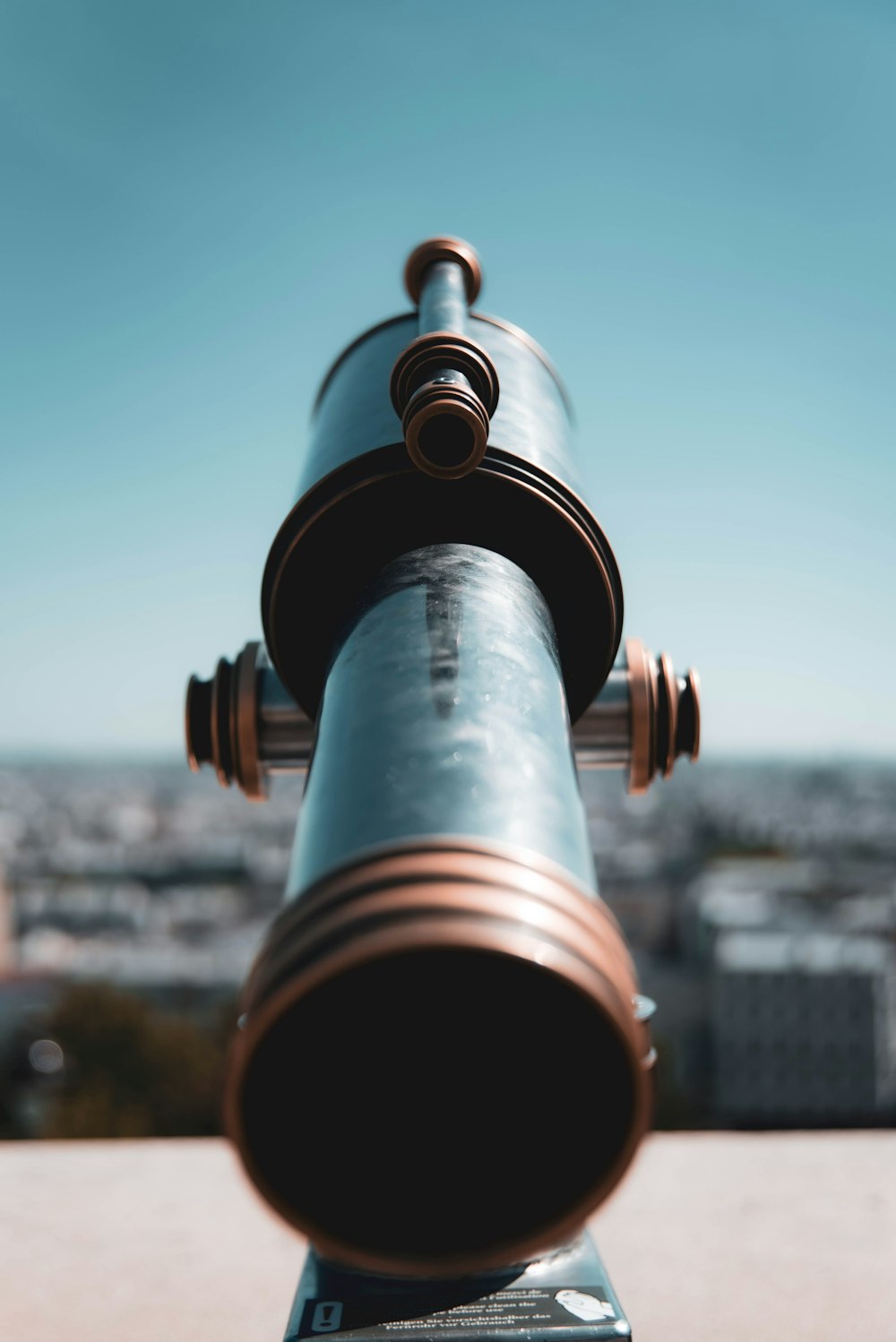 black and silver telescope during daytime