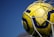 yellow and black soccer ball