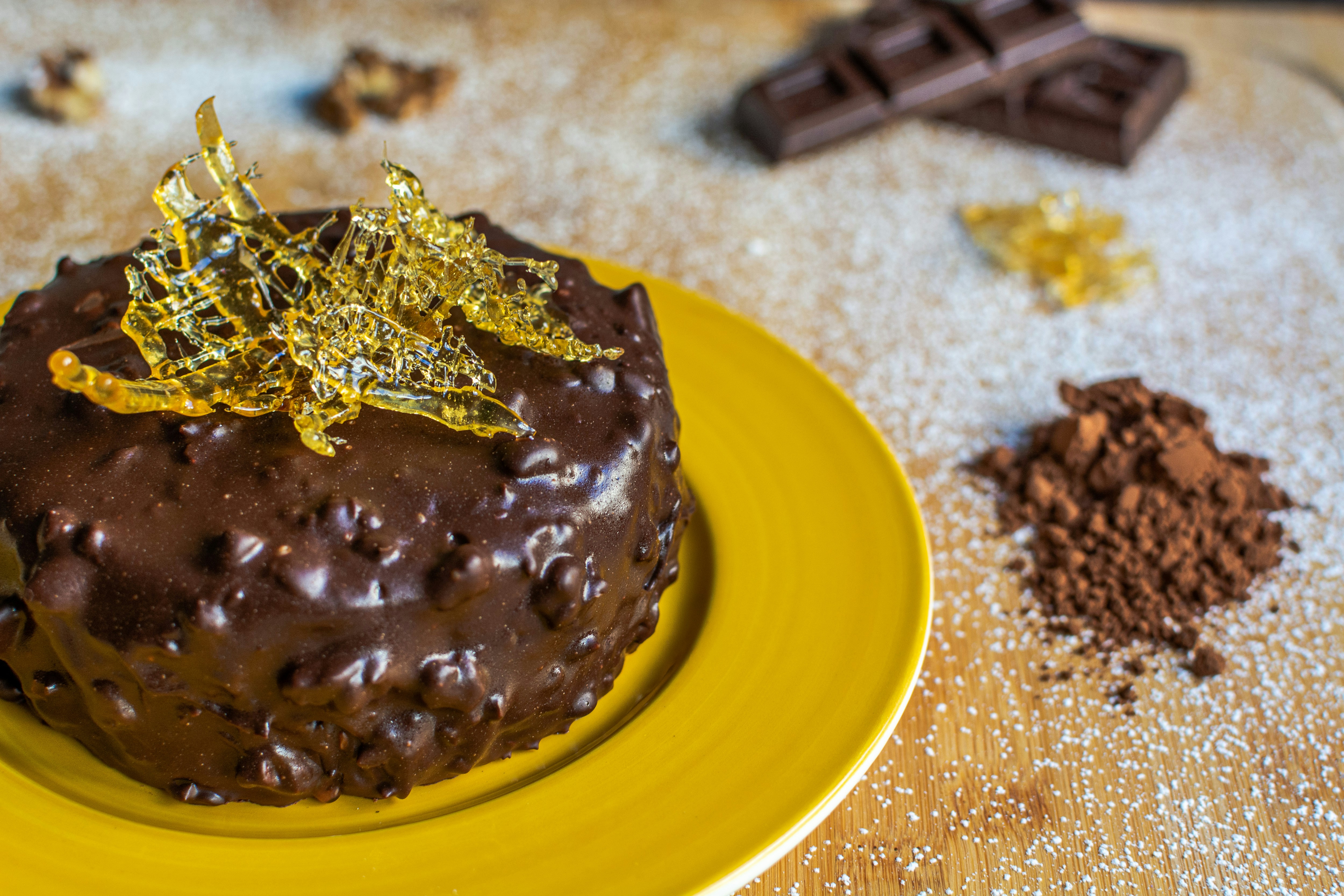 chocolate cake on yellow plate