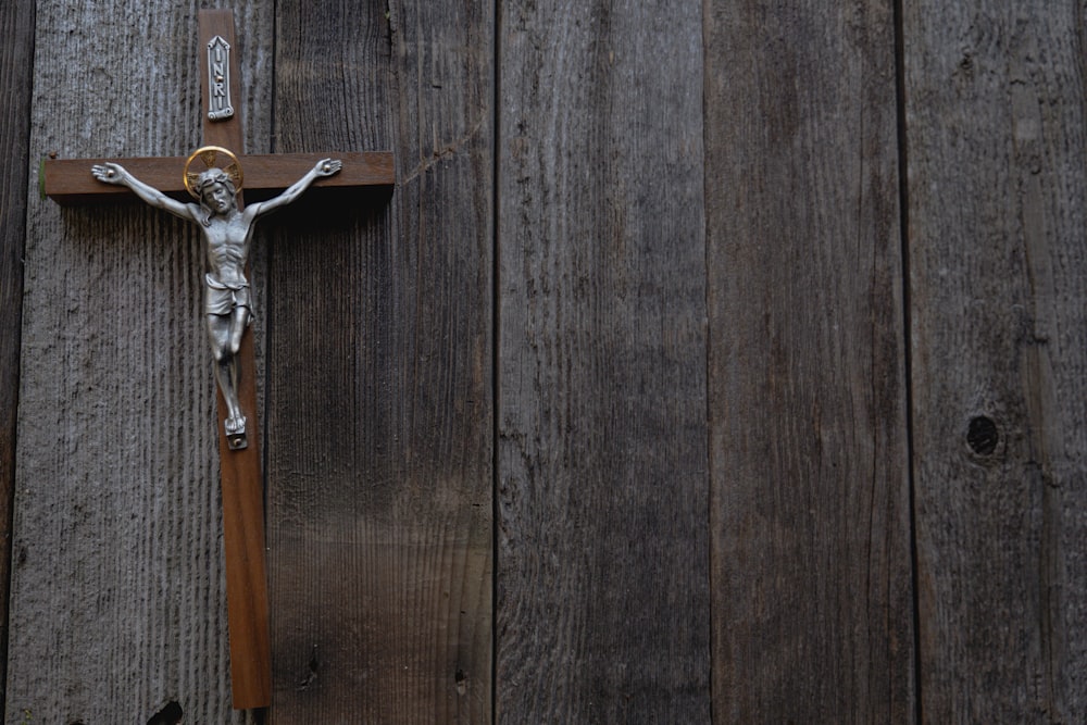 brown wooden door with silver key