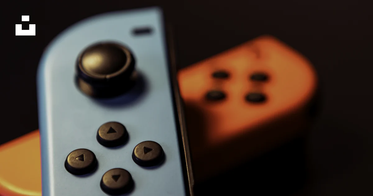 Red Remote Console Red and black remote control photo – Free Game Image on Unsplash