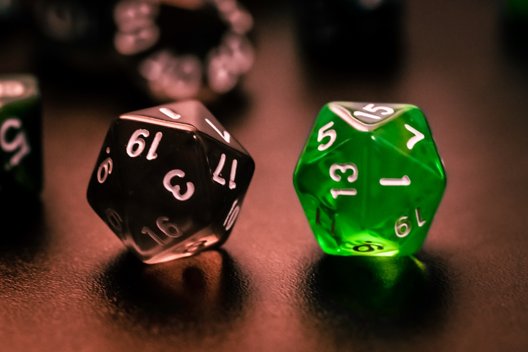 Random Stuff . . . green and black dice on brown wooden table
