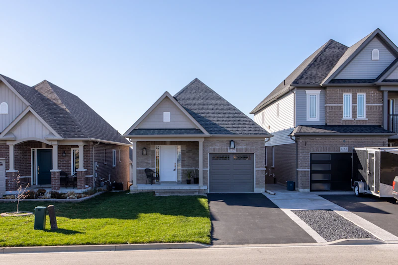 New homes with freshly poured concrete driveways