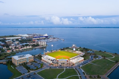 aerial view of city near body of water during daytime