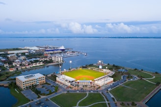 aerial view of city near body of water during daytime