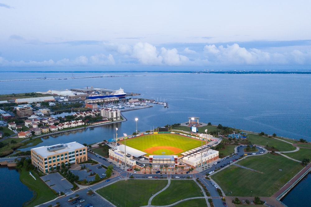 aerial view of city near body of water during daytime