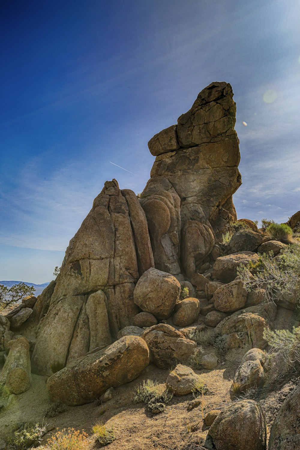 brown rock formation under blue sky during daytime