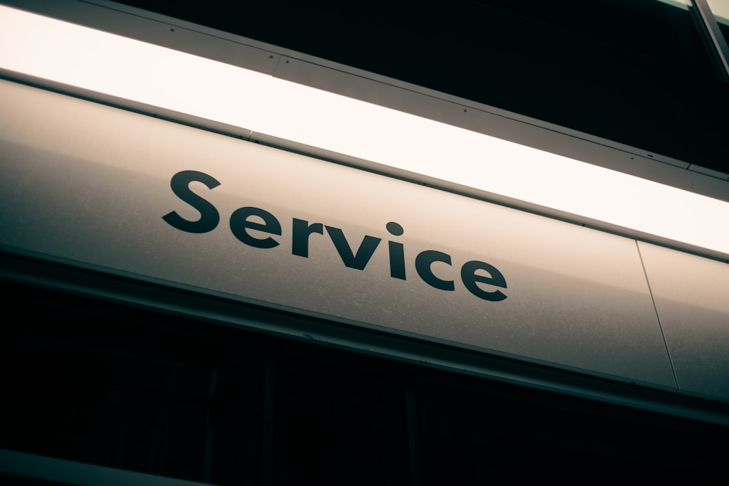 white and black service sign