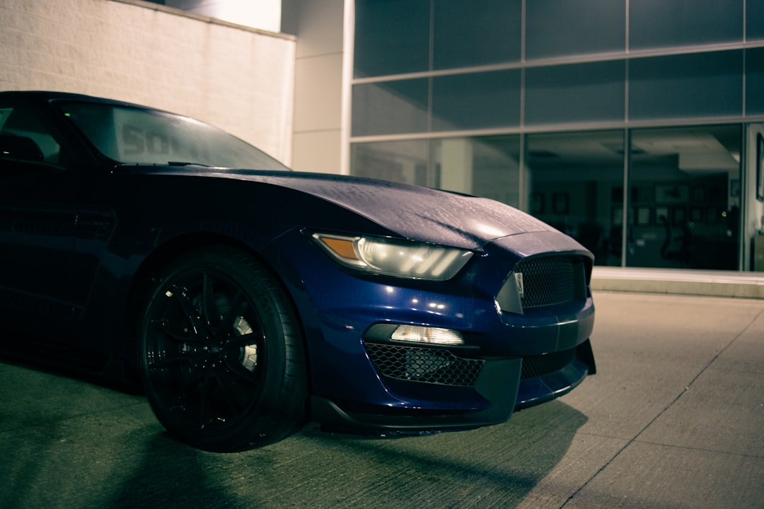 black bmw m 3 parked in garage