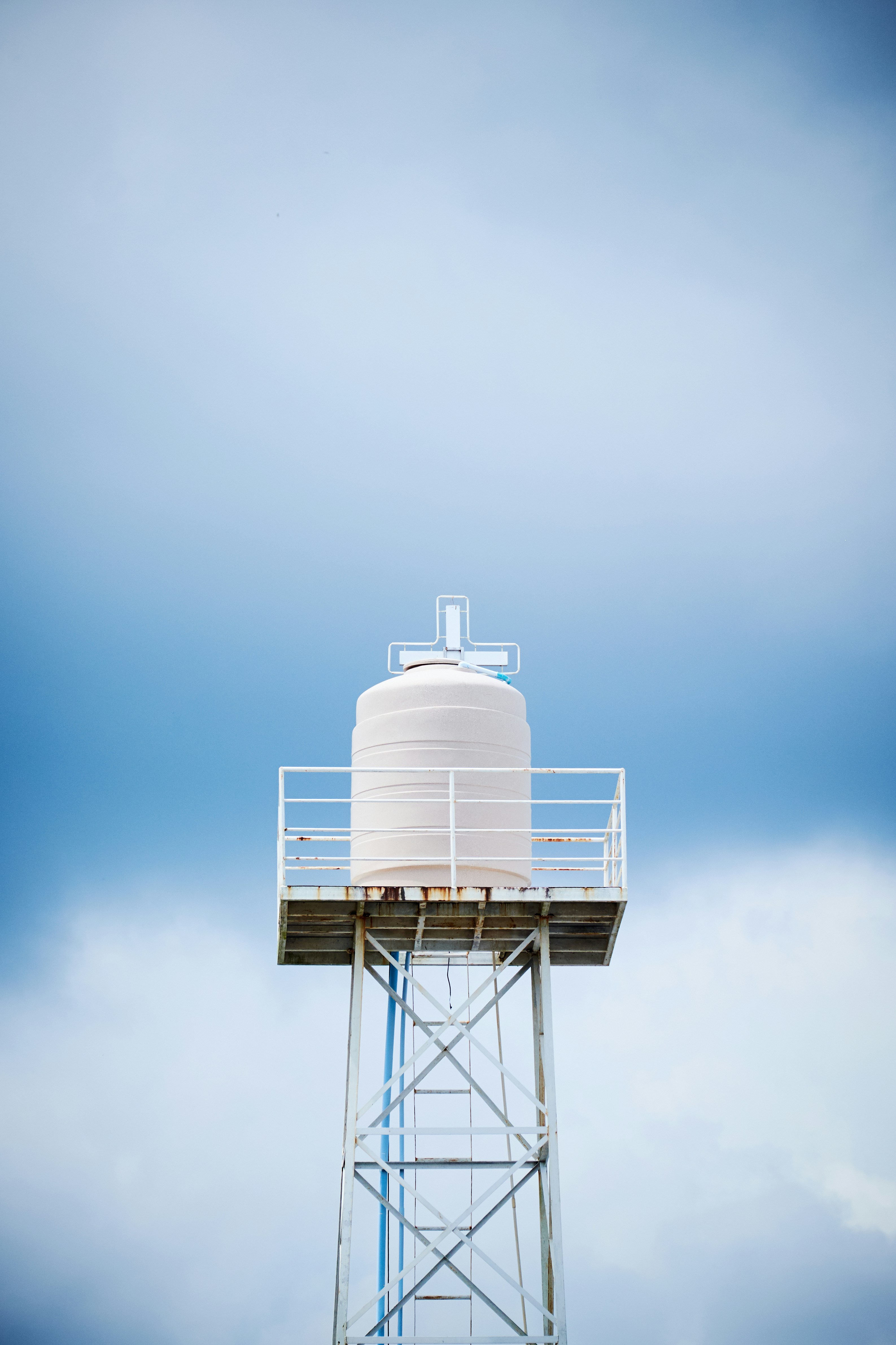 white-and-brown-round-tower-under-blue-sky-during-daytime