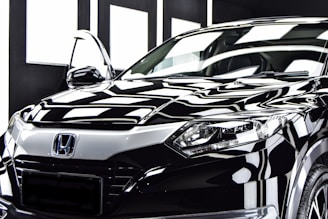 a black and white photo of a car