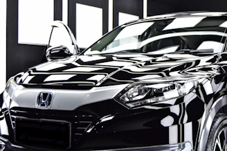 a black and white photo of a car