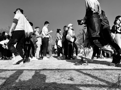 Community members participating in a health awareness walk on a sunny day.