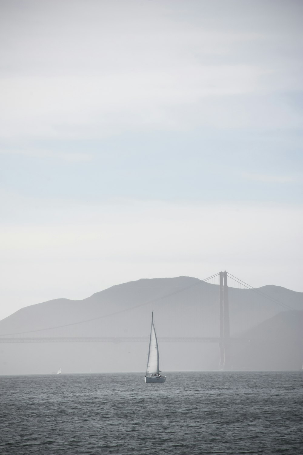 black and white boat on sea during daytime