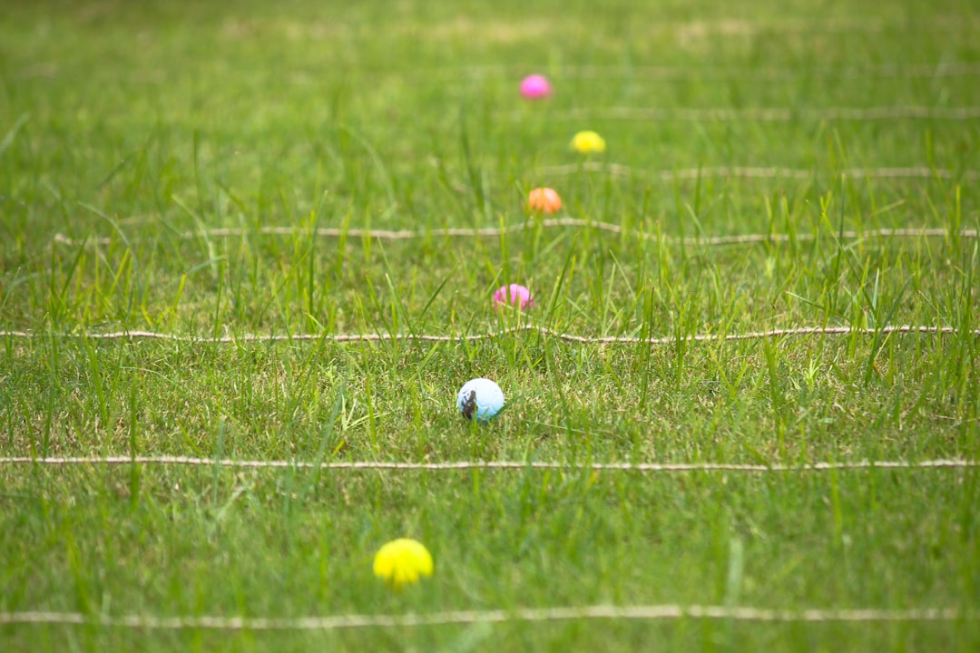 social distancing concept with ball on grass