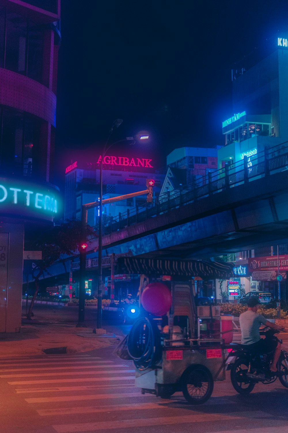 cars parked in front of building during night time