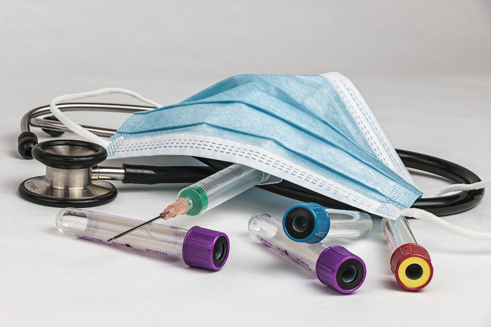 Medical Stethoscope Twisted In Heart Shape Lying On Patient Medical History  List And Blue Doctor Uniform Closeup Stock Photo, Picture and Royalty Free  Image. Image 80480566.